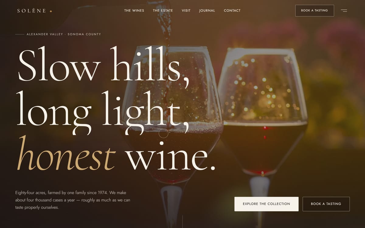 The Solene Estate homepage: cream serif type reading Slow hills, long light, honest wine, over a dark photograph of two glasses of red wine being poured